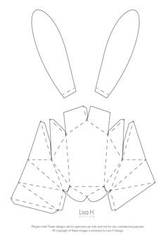 the paper bunny's ears are cut out and placed on top of each other