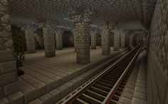 a train track running through an underground tunnel