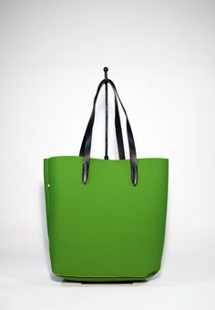 A fresh and modern style Neoprene Tote Bag-Green is made from high quality Neoprene.The minimalist design of this soft and sturdy tote bag suits any outfit and makes it a perfect every day bag. Ideal for the gym, study, travel, work, as baby bag or as an every day bag. Raw edges and no lining makes this style super light and easy to fold when traveling. Details:Color: greenMaterial: Soft neoprene Fits a laptop (up to 15 inch)inside zipped loose pocket to store your valuablesLeather shoulder stra Modern Large Capacity Canvas Bag For On-the-go, Trendy On-the-go Tote Laptop Bag, Green Canvas Bag With Leather Handles For On-the-go, Green Rectangular Laptop Bag For On-the-go, Green Satchel Canvas Bag For Everyday, Green Top Handle Bag For Everyday, Green Top Handle Everyday Bag, Everyday Green Top Handle Bag, Trendy Rectangular Diaper Bag For Everyday Use