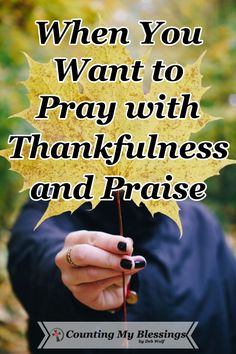 a woman holding a yellow leaf with the words when you want to pray with thanksgiving and praise