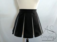 "This pleated skirt, with peek-a-boo style pleats, features one color on the outside of the pleats and another color peeking out from the inside. It is available in any two colors of your choice and is available in any size from petite to plus sized. Pair this skirt with a black tank top for a cheerleader look or achieve an entirely different look by pairing it with the corset front strapless top (available separately) shown in the last photo. This fun skirt is very versatile. Add a Matching Fac Fitted A-line Pleated Tennis Skirt, Black Fitted Skirt With Accordion Pleats, Elegant Fitted School Skirt, Black Fitted Pleated Skirt With Box Pleat, Fitted Black Skirt With Box Pleat, Fitted Accordion Pleats Skirt For School, Fitted Full Pleated Mini Skirt, Fitted Mini Skirt With Box Pleat, Pleated Fitted Full Mini Skirt