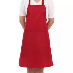 a woman wearing an apron and white shirt