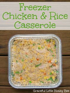 chicken and rice casserole in a pan on a wooden table with text overlay