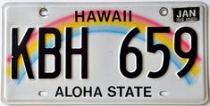 the license plate for hawaii has been painted with rainbows and black letters on it