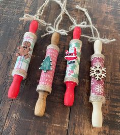 three wine corks with christmas decorations on them