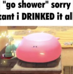 a pink object sitting on top of a counter next to a sign that says, go shower sorry i can't drink it all