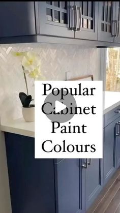 a kitchen with blue cabinets and white counter tops in the background is an advertisement for popular cabinet paint colours