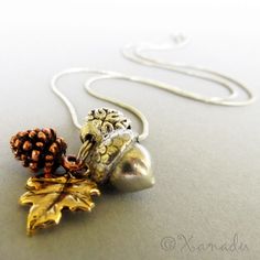 Autumn Harvest Fall Pendant Necklace - Gold Leaf, Copper Pine Cone, Silver Acorn #XanaduDesigns Artisan Jewelry Necklaces, Autumn Harvest, Handcrafted Artisan Jewelry, Fall Jewelry, Leaf Charms, Halloween Jewelry, Oak Tree, Pine Cone, Beautiful Necklace