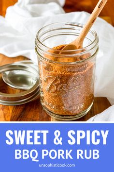 sweet and spicy bbq pork rub in a mason jar with a wooden spoon next to it