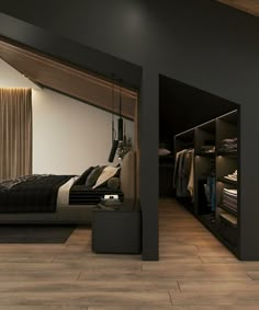 an image of a bedroom setting with black and white decor on the walls, wood flooring