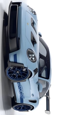 an overhead view of a blue sports car