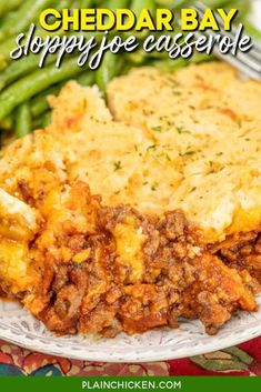 cheddar bay sloppy joe casserole on a plate with green beans