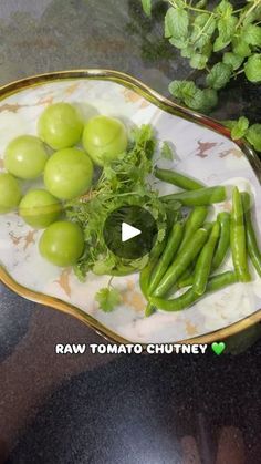 grapes and green beans in a bowl on a table