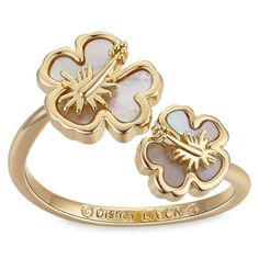 Happy memories of Disney's Lilo & Stitch will always be on hand with this elegant ring. The goldtone design features two tropical hibiscus flowers with Mother of Pearl inlay. Its adjustable bypass styling means it's a perfect fit, in every sense, for Lilo & Stitch fans. Best Valentine's Day Gifts