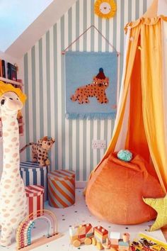 a child's room with toys and decor