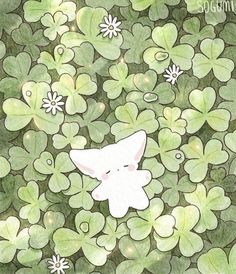 a drawing of an animal surrounded by clover leaves