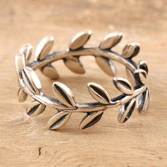 Let sinuous vines wrap your finger in delicate beauty with this lovely ring designed by India's Shivani Choudhary. Crafted from sterling silver, the band ring features a garland of leaves that circles your finger in a graceful pattern. Leaf Ring Design, Plant Ring, Plant Rings, Silver Leaf Ring, Delicate Beauty, Sterling Silver Rings Bands, Leaf Ring, Lovely Ring, Silver Band Ring