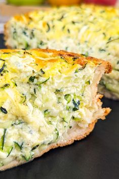 a quiche with cheese and spinach on it