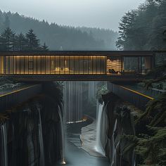 a bridge over a river with waterfall cascading and lights at the top that are lit up