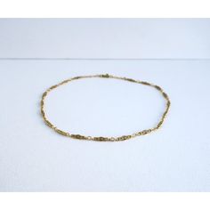 This is part of Chairish’s Fine Jewelry assortment.  A beautiful, elegant, detailed, strong, and well-made choker necklace in 14-karat yellow gold, circa mid to late-20th century. Necklace has beautiful, detailed chain links and detailed bar clasp. A chic vintage piece to wear alone or stack with other necklaces, dress up or down. Very good condition as shown in images. No issues. Marked '14k' on clasp. A true choker necklace measuring: 13.88" long.  Emerald stud earrings (in ear) are also avail Dainty 14k Gold Chain Necklace For Formal Occasions, Vintage Gold Chain Necklace With Delicate Chain, Vintage Gold Delicate Chain Necklace, Elegant Link Choker As Gift, Dainty Oval Link Necklaces For Formal Occasions, Dainty Oval Link Necklace For Formal Occasions, Dainty Yellow Gold Chain Necklace For Formal Use, Dainty Yellow Gold Chain Necklace For Formal Occasions, 14k Gold Chain Necklace For Wedding