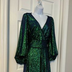 Never Worn, Fit And Flare Special Occasion Dress. Sleeves Are 3/4 Length. Bust Measures 17.5" Across And Waist Measures 15". Please Note That There Is Not Any Stretch To The Dress So Check Measurements Please. Navy Sequin Dress, Green Sequin Dress, Dress Sleeves, Green Dresses, Special Occasion Dress, Green Sequins, Special Occasion Dresses, Sequin Dress, Green Dress