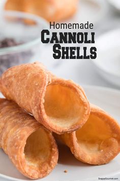 homemade cannoli shells stacked on top of each other with text overlay reading homemade cannoli shells