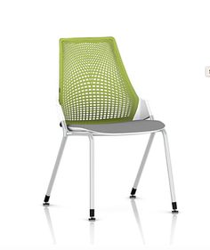 an office chair with a green back and seat cover on the side, in front of a white background