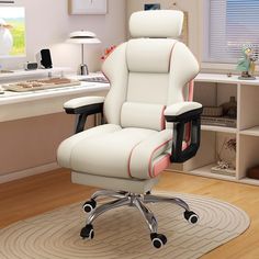 a white office chair sitting on top of a hard wood floor