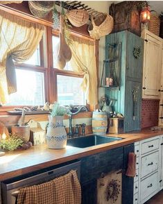 a kitchen filled with lots of counter top space next to a stove top oven and dishwasher