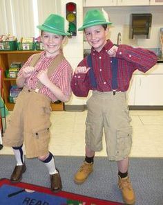 two young boys standing next to each other