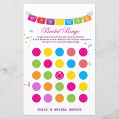 the bridal bingo game is displayed on a white surface with colorful circles and streamers