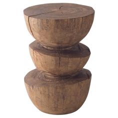 three wooden bowls stacked on top of each other