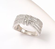 a diamond ring on a white background