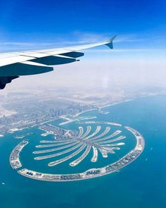 an aerial view of the palm island in the middle of the ocean