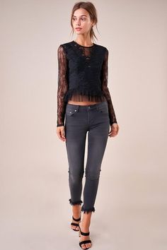 The Temptress is a sheer lace top covered in a floral design. The top features a high neckline, long fitted sleeves, and a darted bodice with a cropped, pleated hem. This ultra-sultry number is perfect for showing off your midriff in jeans and heels. Model is 5'9" and wearing size small. Pre-Order Now! Estimated Shipping Date October 25, 2019. Available in black. 100% polyester. Imported. Fitted Mesh Top With Lace Detail For Party, Sheer Lace Top, Fitted Sleeves, Lace Long Sleeve, October 25, Sheer Lace, High Neckline, Long Sleeve Lace, Pre Order