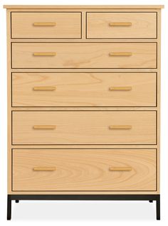 the chest of drawers is made from wood and has four drawers, one with black legs