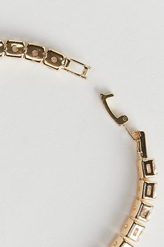 Tennis bracelet with a classic look. Rhinestone accent bracelet with a simple clasp closure. Features Jett tennis bracelet Rhinestone bracelet Classic look Clasp closure Content + Care Mixed metal, glass Wipe clean Imported Size Dimensions: 8.5" l | Jett Tennis Bracelet in Gold, Men's at Urban Outfitters Elegant Gold Jewelry From Urban Outfitters, Elegant Gold Urban Outfitters Jewelry, Men's Shoes Accessories, Women Men Shoes, Rhinestone Bracelet, Mixed Metals, Tennis Bracelet, Classic Looks, Color Coding