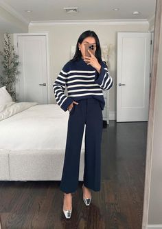 What To Wear With Navy Pants: 11 Everyday Outfits - The Wandering Girl Navy Sweater Outfit, Lady Day Coat, Winter Office Outfit, Striped Sweater Outfit, Orb Earrings, Pants Outfit Work