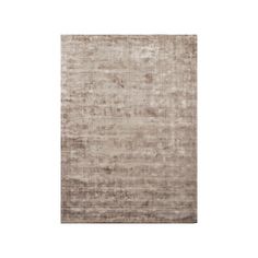 a beige rug with faded edges