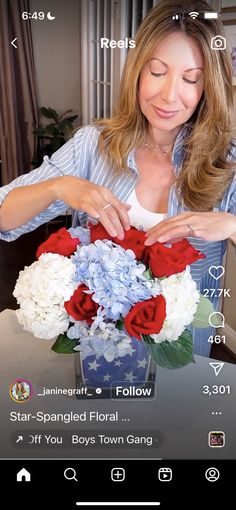 a woman arranging flowers in a vase on her cell phone with the caption, star spangled floral bouquet