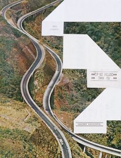 an aerial view of a winding road with arrows pointing in the direction of different directions