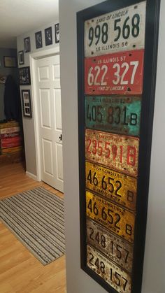 this is an old license plate sign in a house's entry way, with the number on it