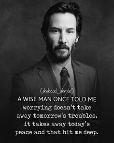 a man in a suit and tie with a quote