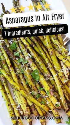 asparagus in air fryer on a white plate with parmesan sprinkles