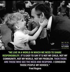 a man holding a small child in his arms with a quote from the movie,