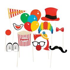 an assortment of party photo props including balloons, hats, and clown nose stickers