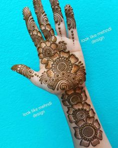 a hand with henna designs on it and instructions for how to do the henna