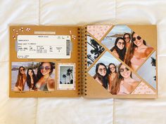 an open photo book with pictures of women on it and a passport attached to the cover