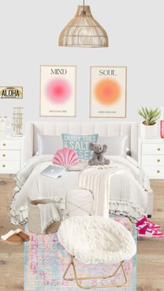 a bedroom with white furniture and pink accessories on the bed, along with two paintings