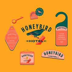 an assortment of stickers and tags from the honeybird hotel, including one bird